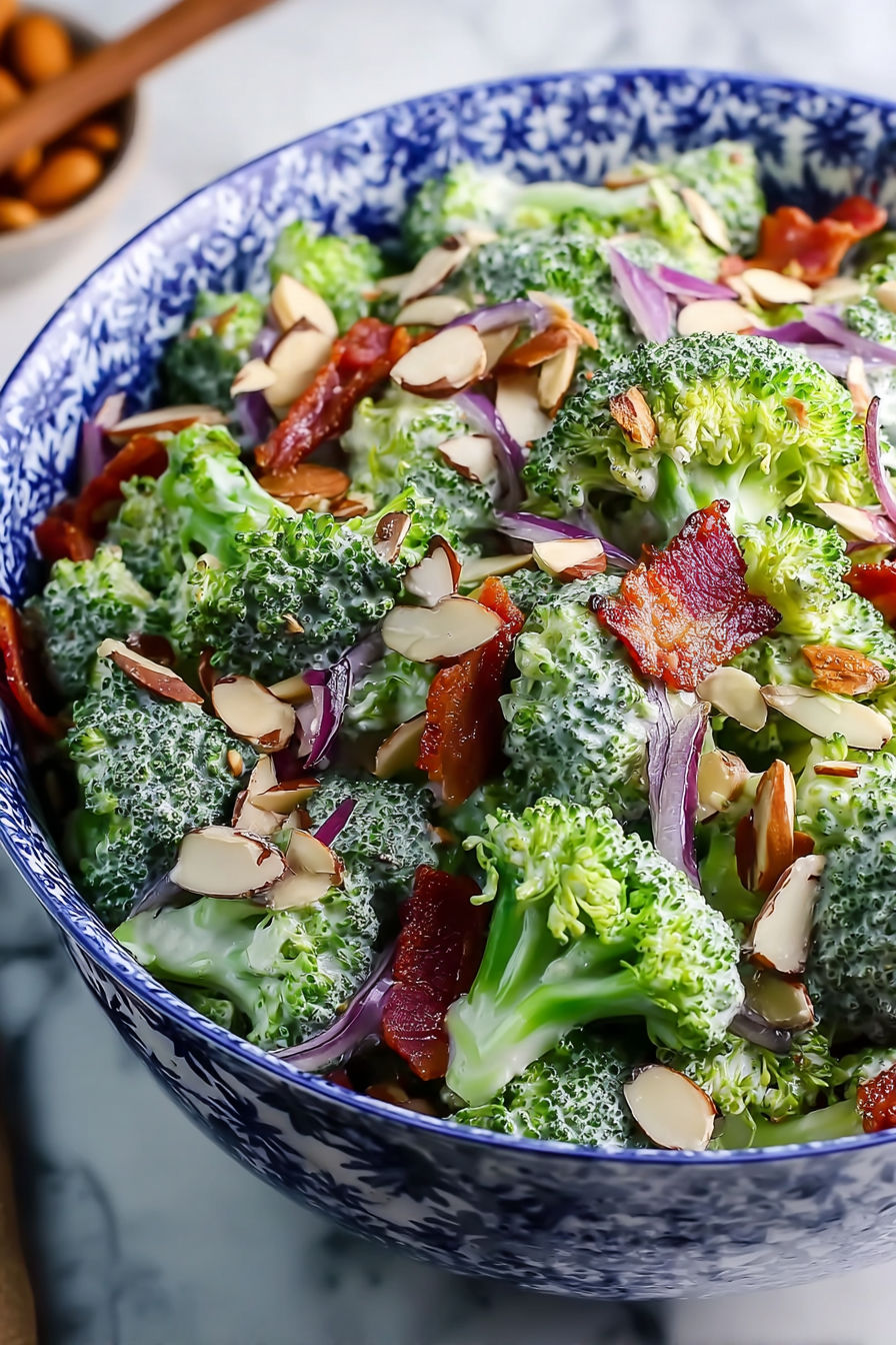 A bowl of broccoli and bacon salad.