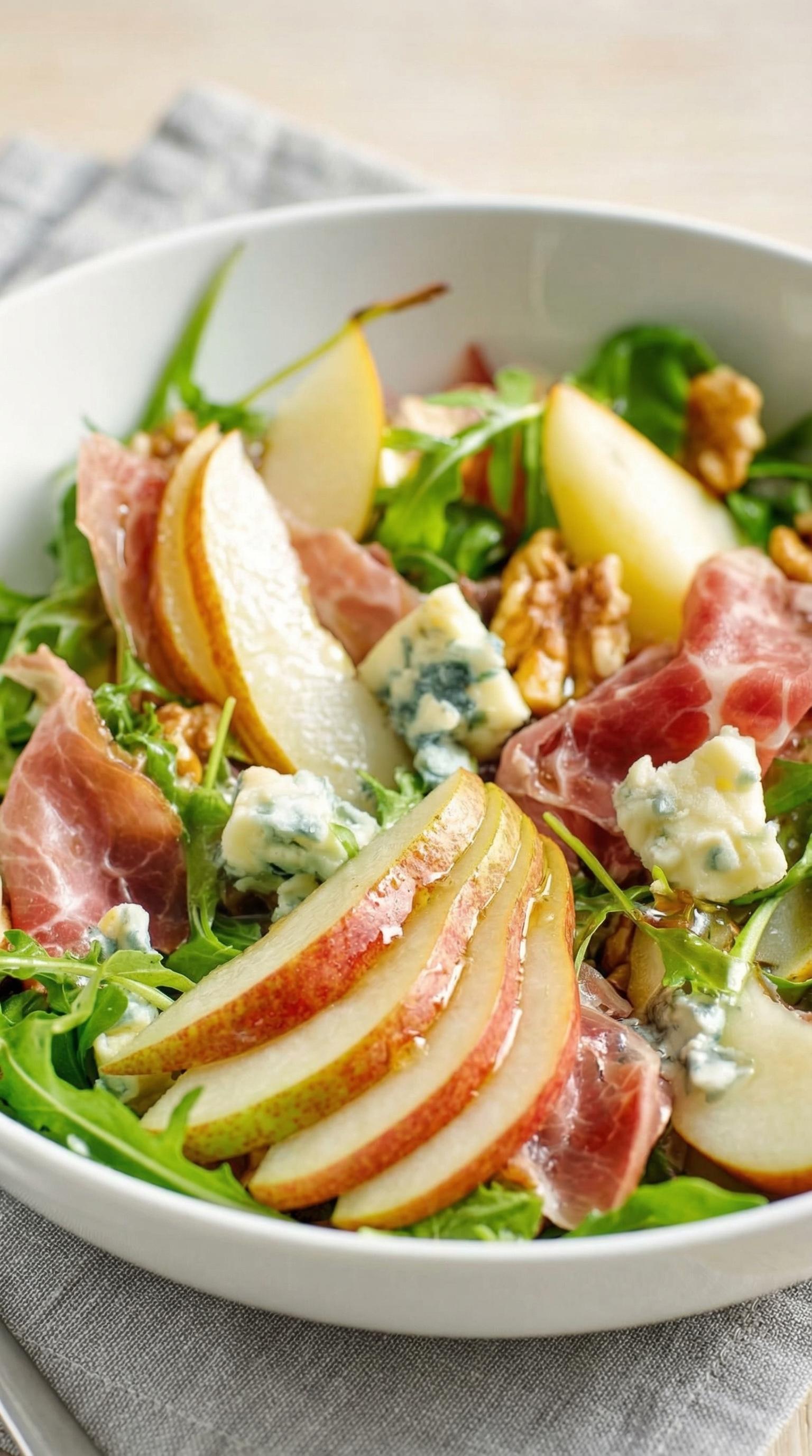 A salad with apples and blue cheese.