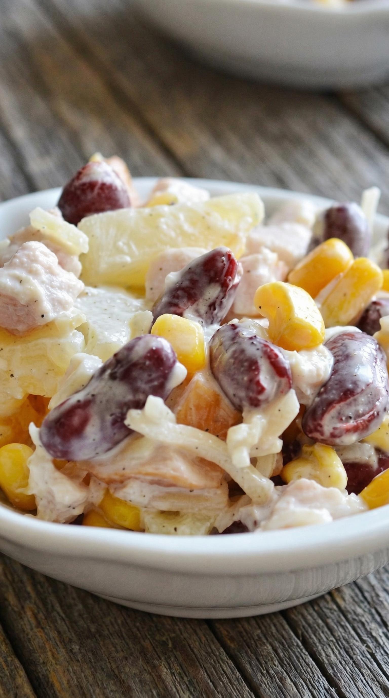 A bowl of salad with various ingredients.