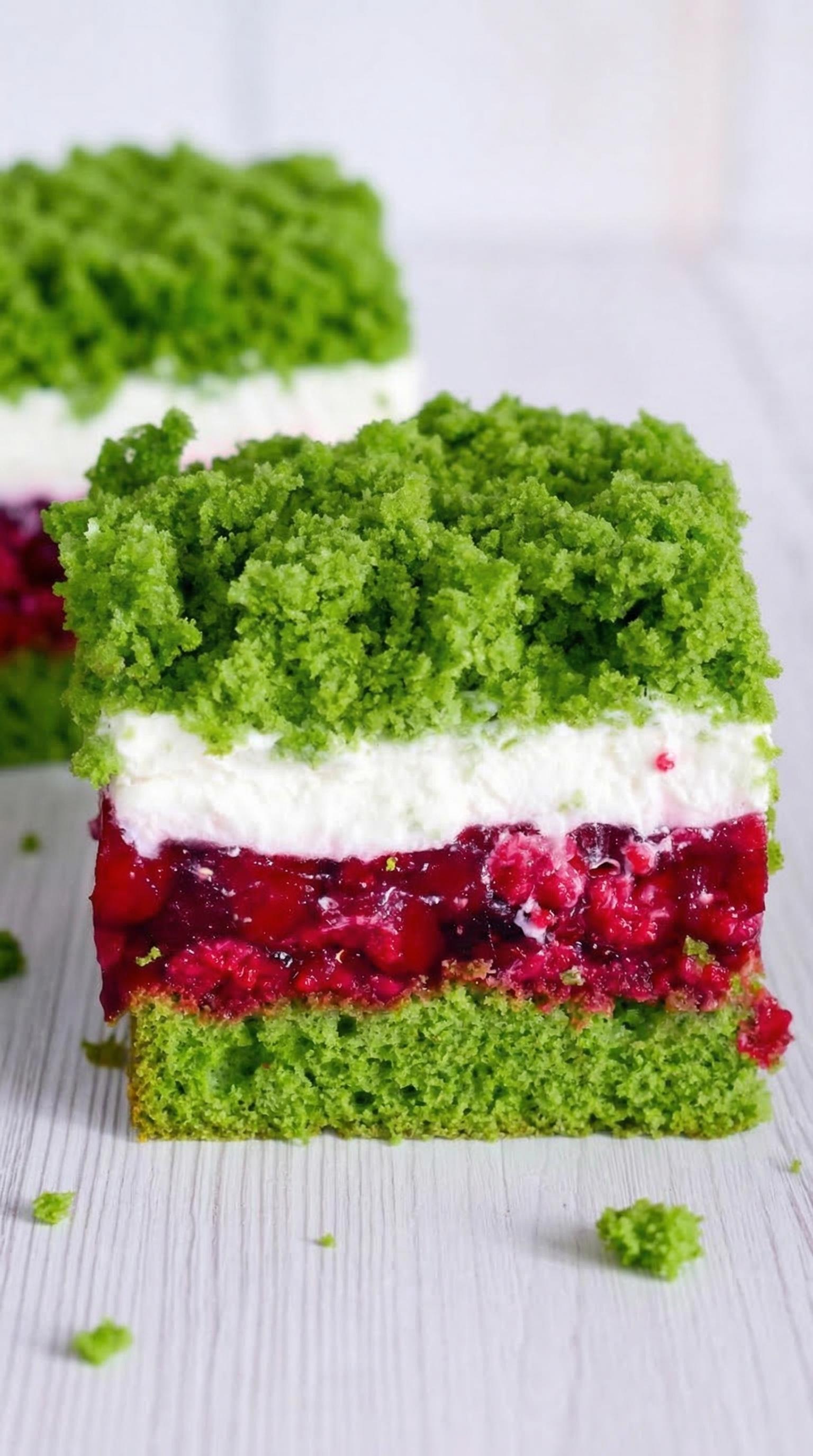A slice of green and white cake.
