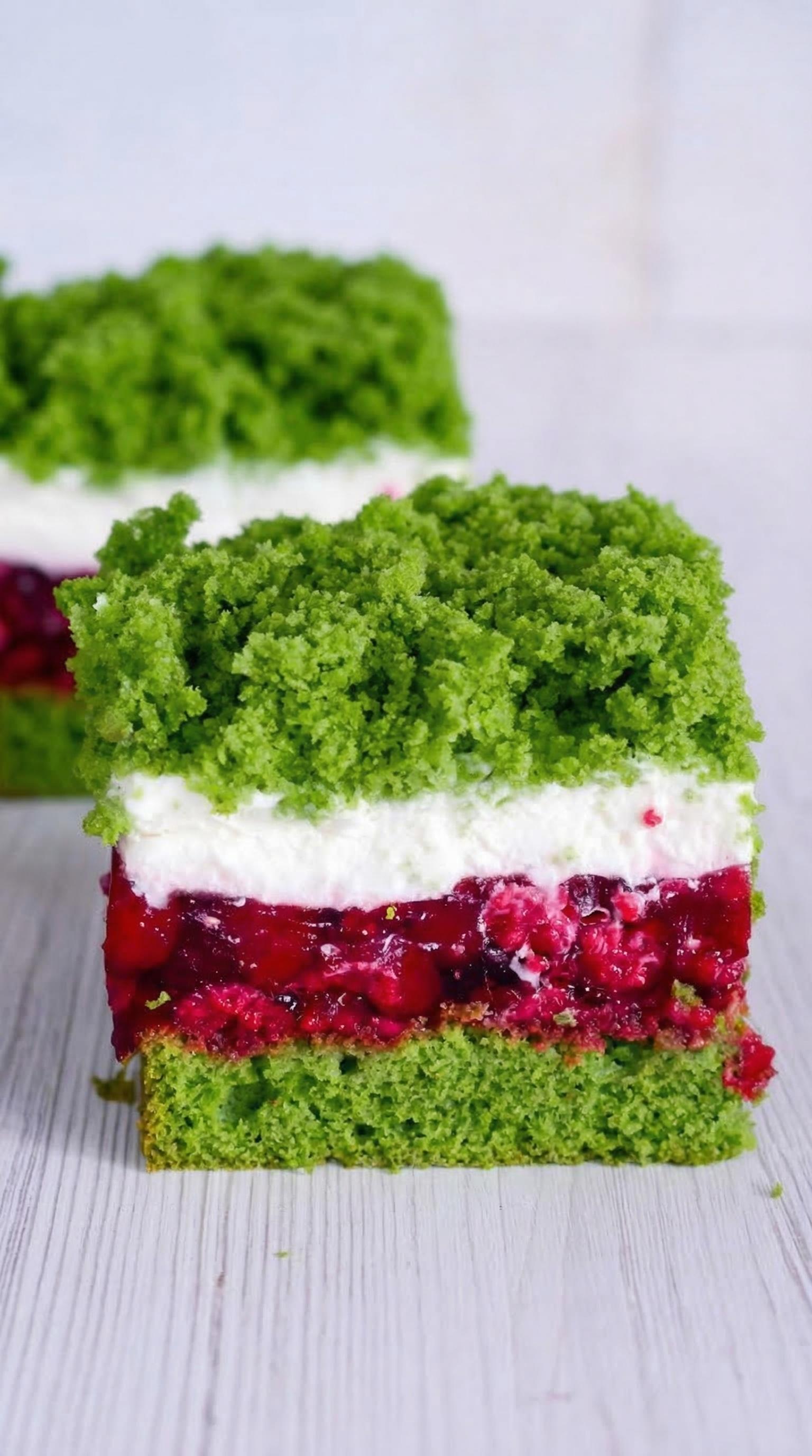 A slice of green and white cake.