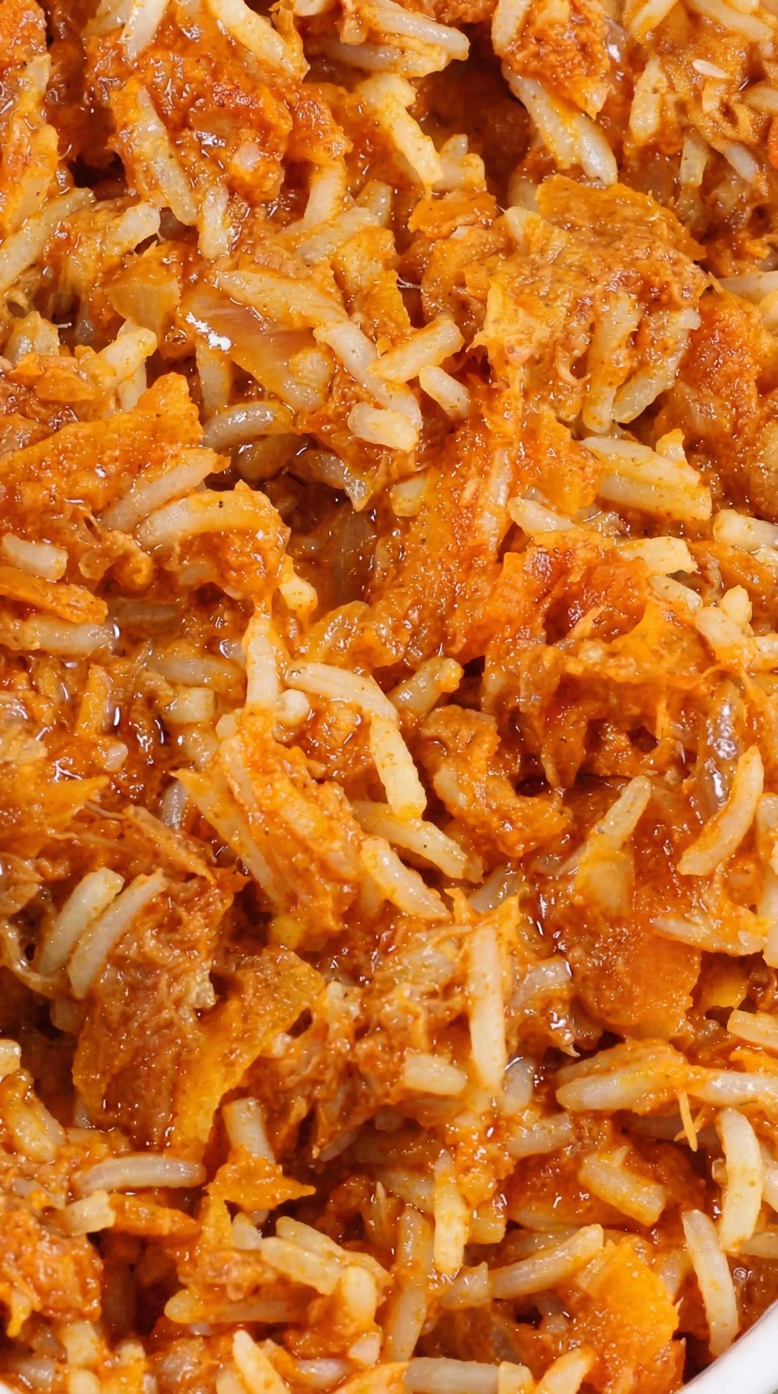 A close up of a delicious meal with rice, fish and onions.