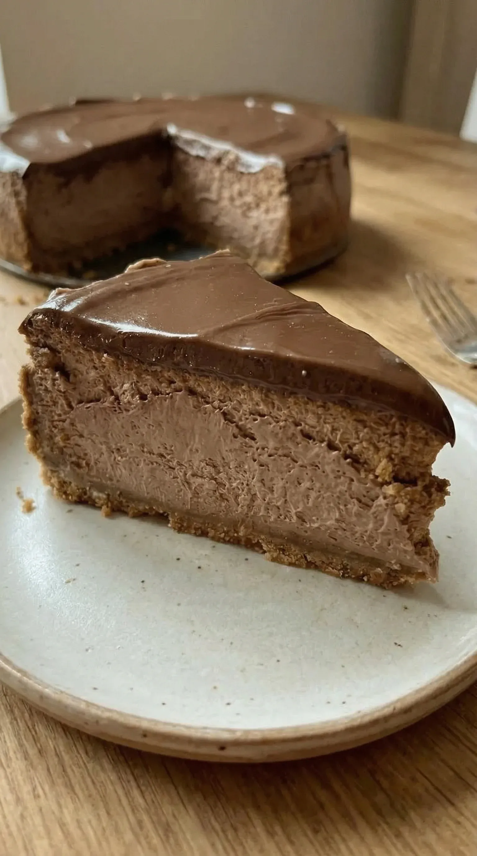 A slice of chocolate cake on a plate.