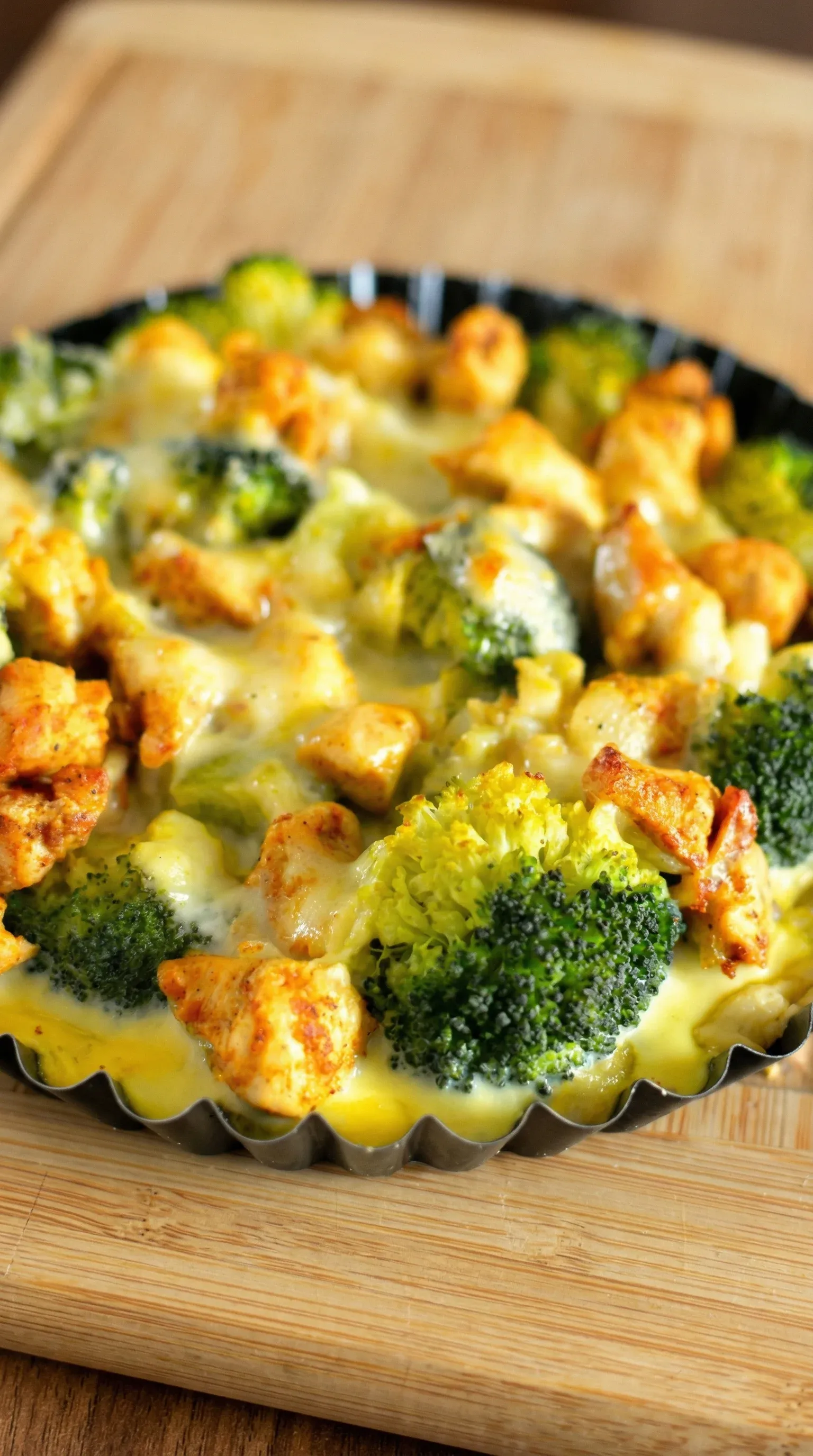 A dish with broccoli and chicken.
