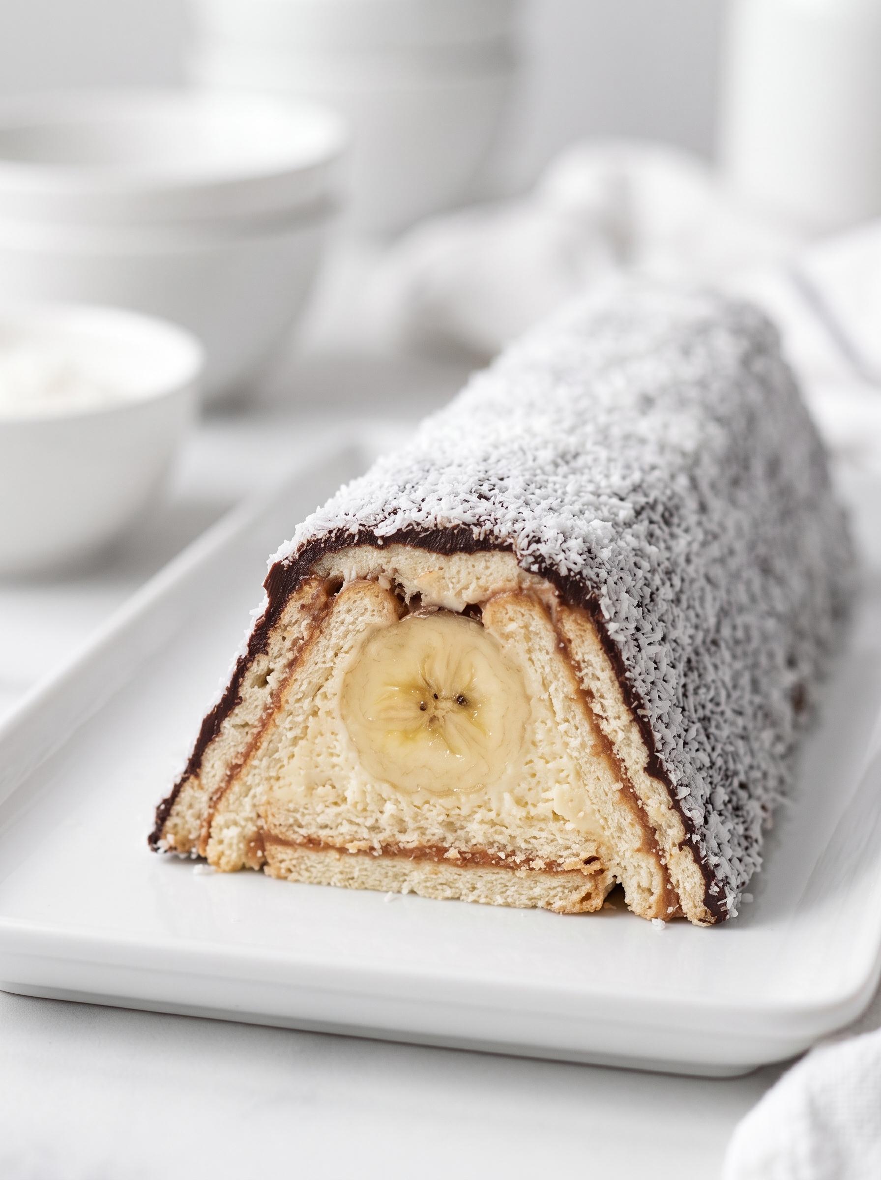 A pastry with a banana in the middle.