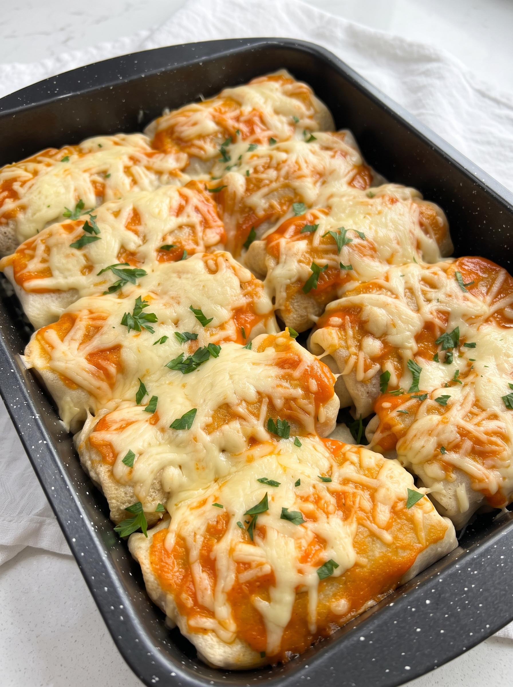 A dish of food with cheese and meat.