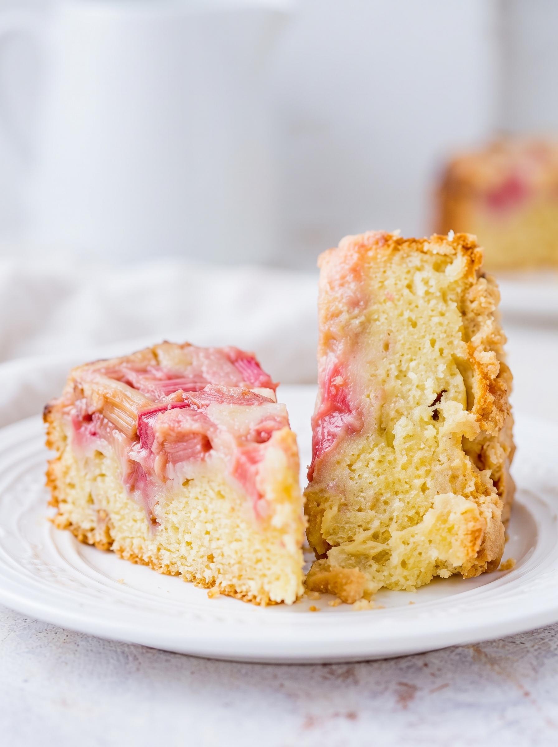 A slice of cake with strawberry and cream filling.